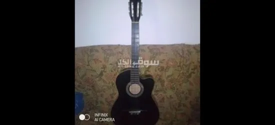 جيتار كلاسيك للبيع مفهوش خربوش النوع ECHO او التبديل ب كمنجه
