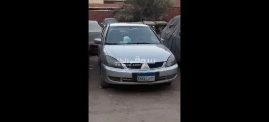 سيارة لانسر بومة