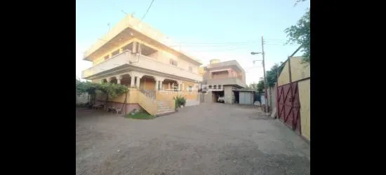 2 بيت وحديقه على 9 قيراط محاطين بسور ( كردون )