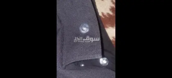 شنطه كتف سوداء فيها رسمه من الخارج وجيوب الداخل بناتي قماش - 5